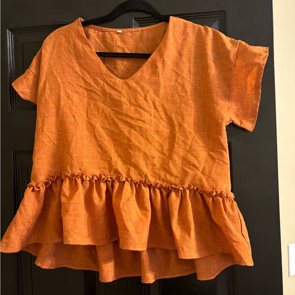 Ruffle blouse slightly cropped